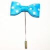 A blue bow tie with white polka dots on it.