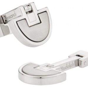 A pair of silver cufflinks with the word " buckle ".