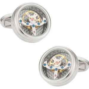 A pair of cufflinks with a watch movement.