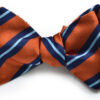 A bow tie with orange and blue stripes.